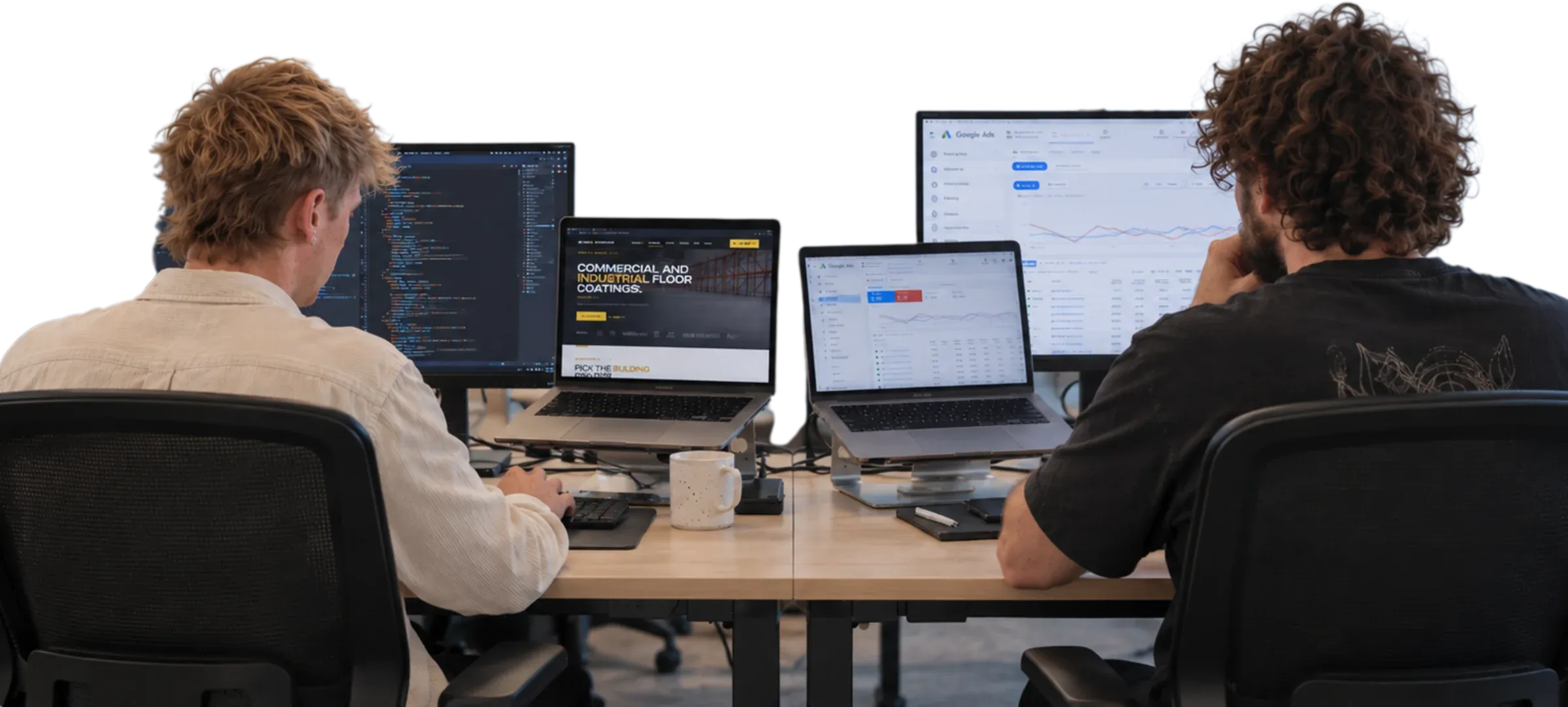 Timo and Floris, the two founders of Traffic To Talks, at their desks with their screens