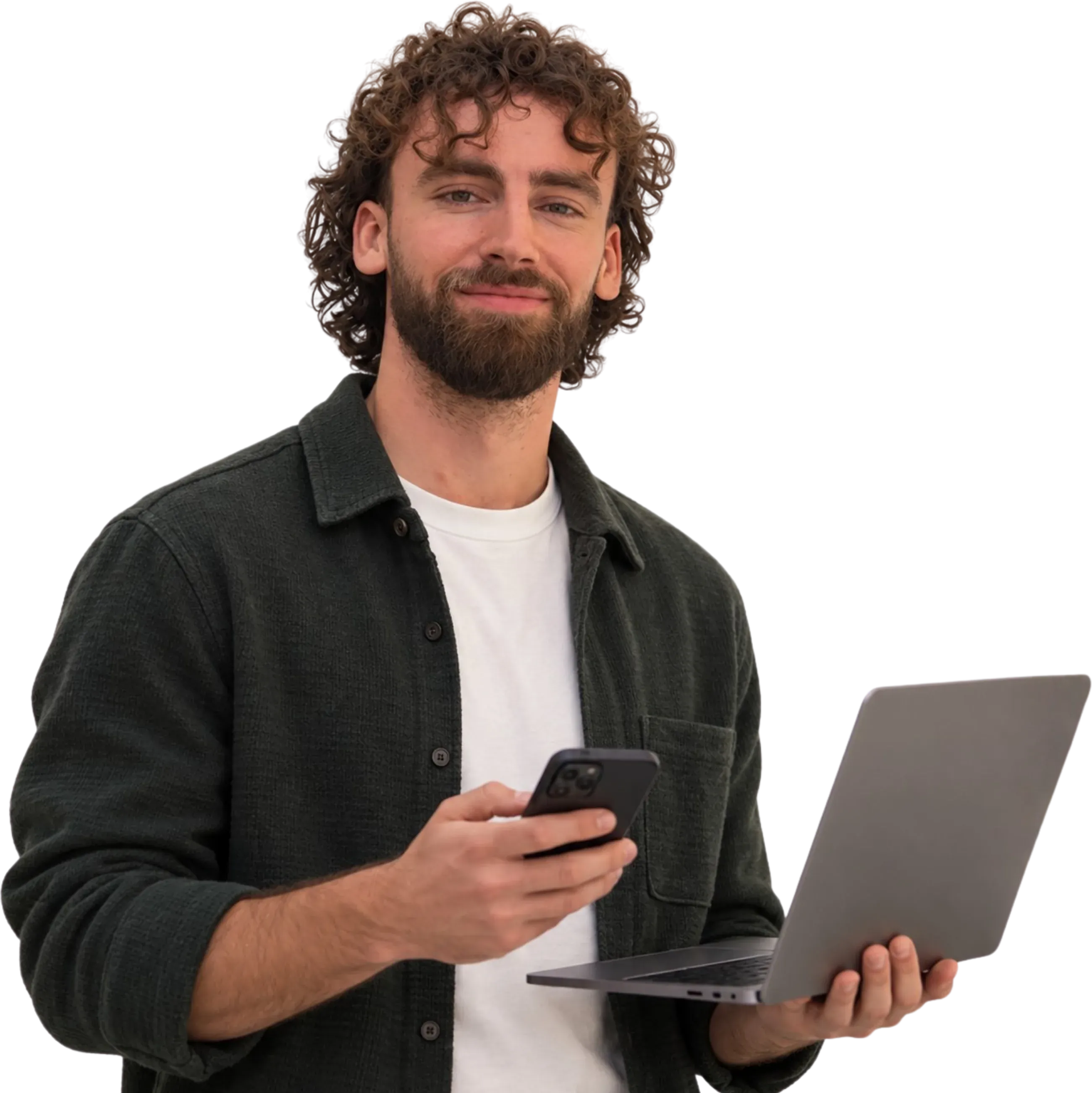 Floris, co-founder of Traffic To Talks, with his phone in one hand and an open laptop in the other